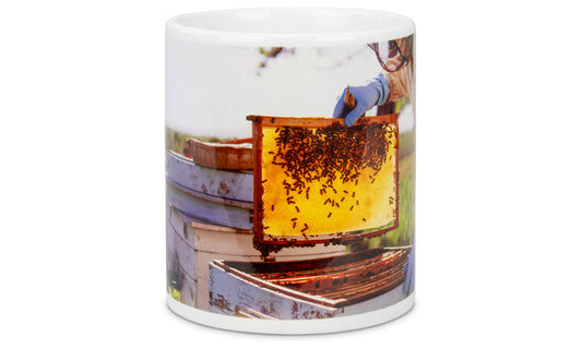 Kopp med birøktermotiv